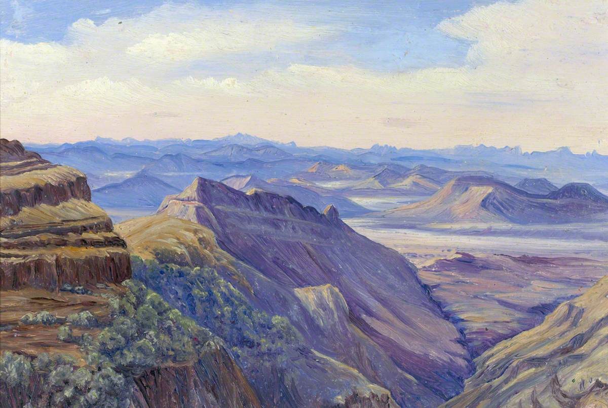 Figura 39 -Paisagem montanhosa de relevo escarpado e vales amplos, destacando a vastidão cênica e a aridez regional.
